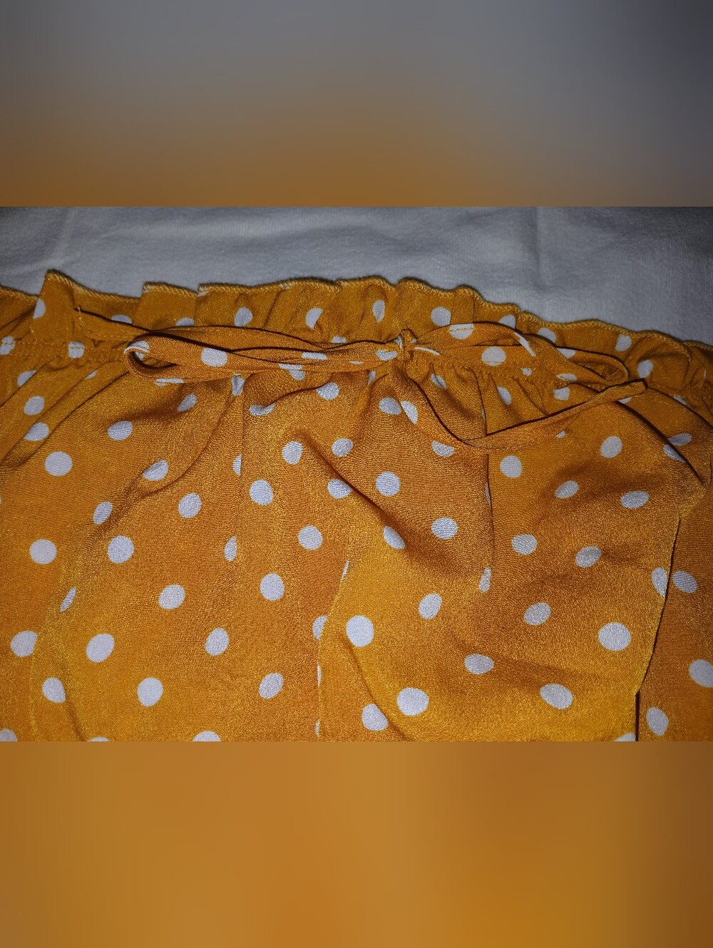Pre-loved Women's Polka Dot Ruffle Halter Top in Mustard Yellow.